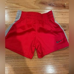 Nike | baby boy red shorts | size: 12 months